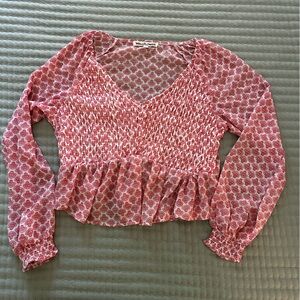 Pink and white print blouse